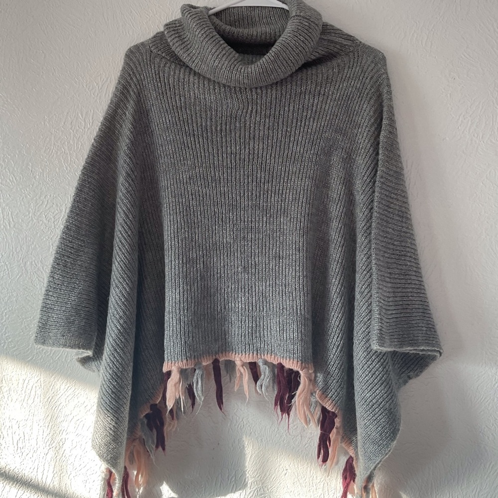 Libby Eldelman Gray turtleneck sweater with pink and grey fringe details